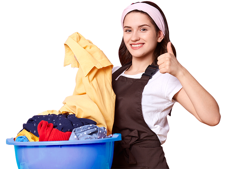 A woman holding washed clothes happily