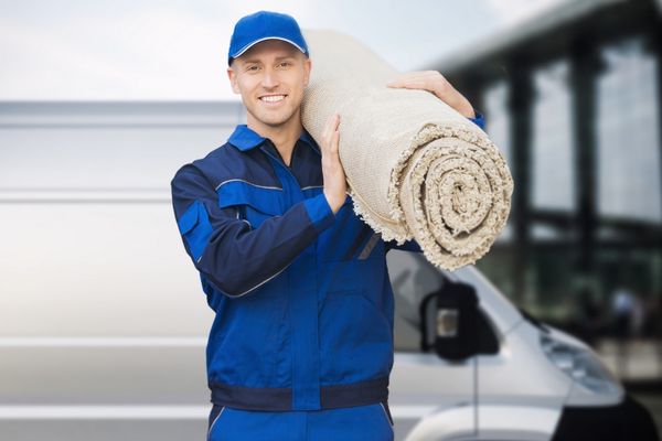 man holding carpet