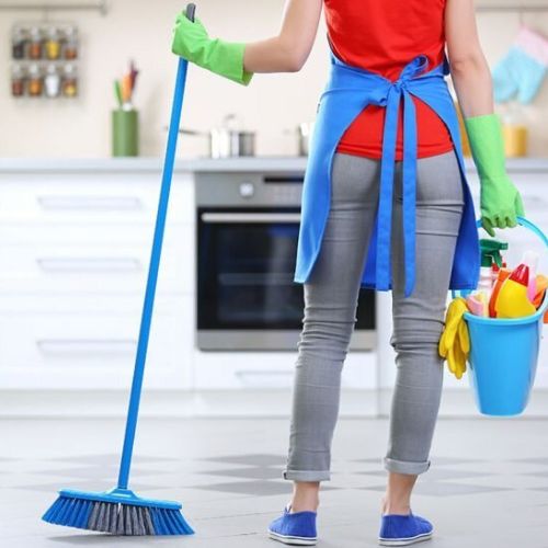 woman holding mop