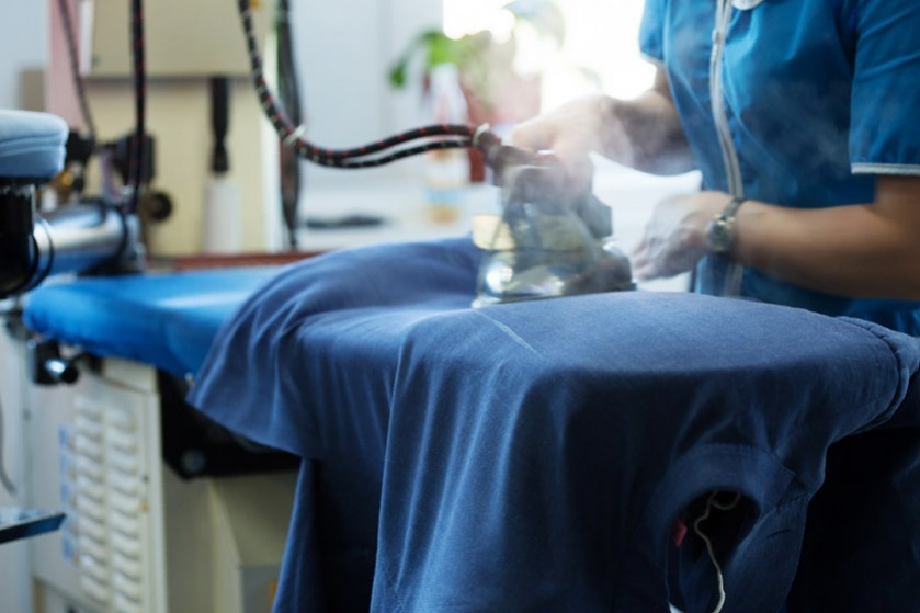 woman ironing clothes