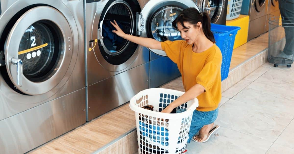 Dubai Marina laundry services - A girl is doing laundry